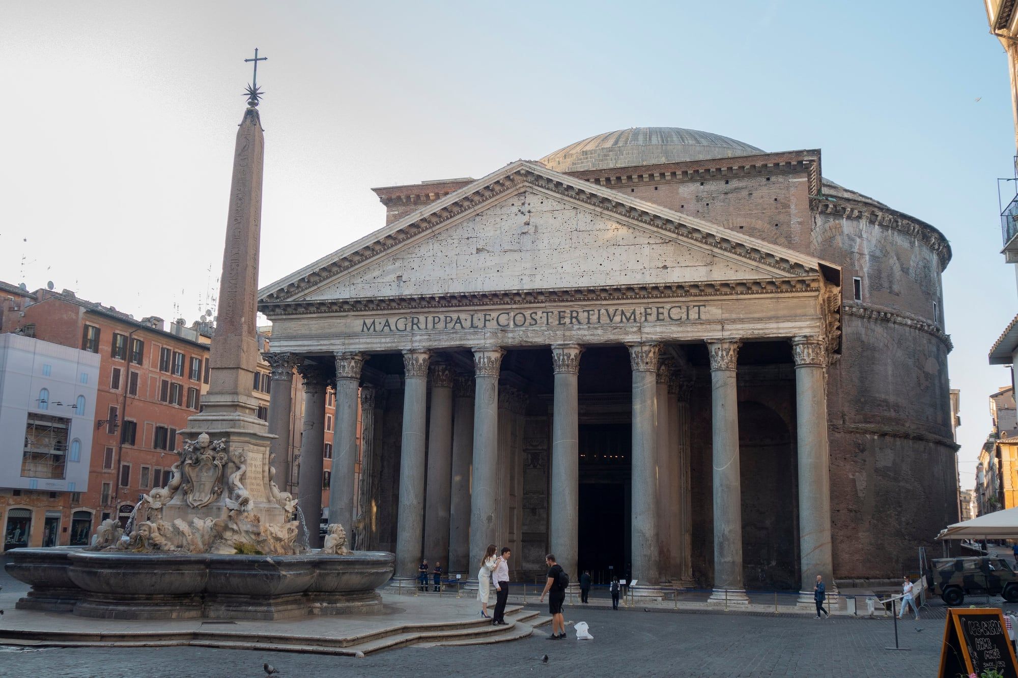 Front portico of the Pantheon in Rome with its granite columns and the fountain on Piazza della Rotonda